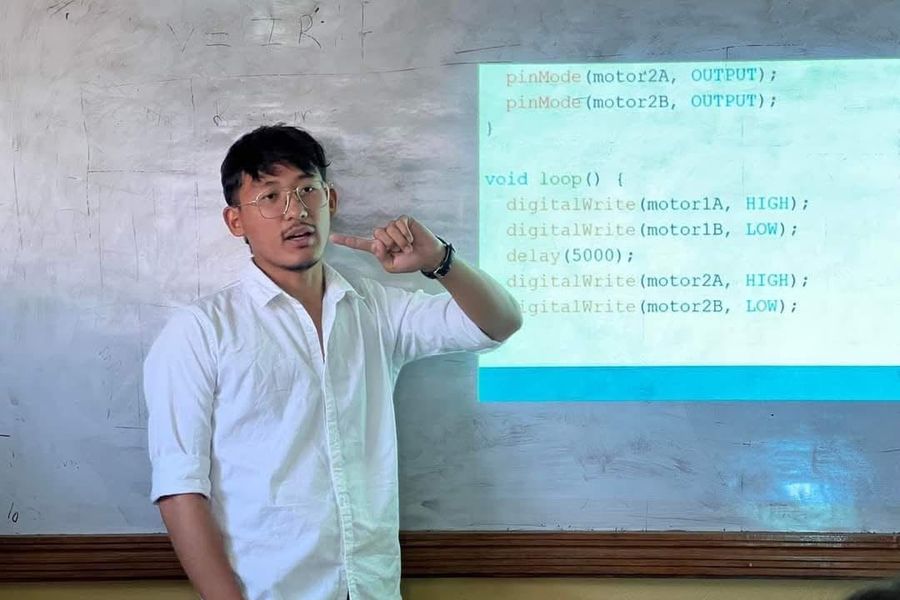 Aashish Rai walking a class through Arduino motor control code