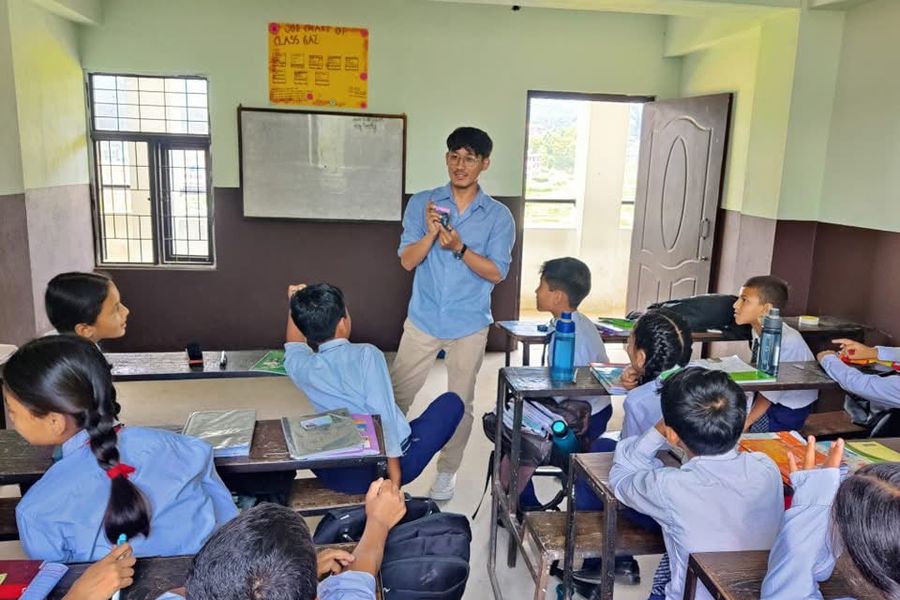 Aashish Rai teaching a lower-secondary science class in Nepal